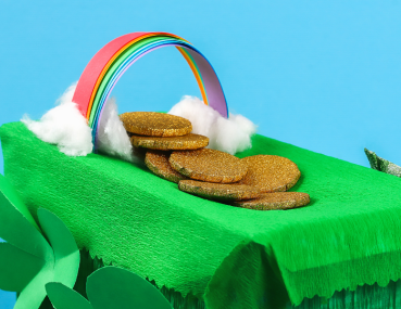 The final step in the leprechaun trap project, showcasing the completed trap adorned with glitter, gold coins, and a tempting display to lure in a leprechaun.