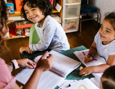 A homeschool instructor teaching her kids STEM subjects.