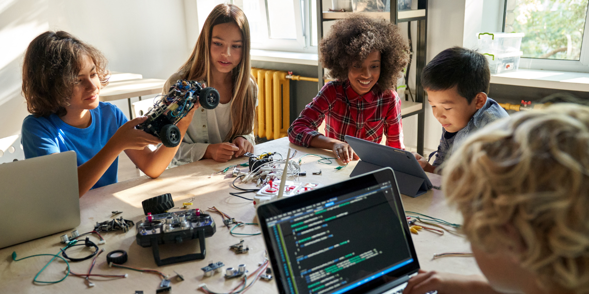 A group of kids exploring science through hands-on experiments, showcasing how STEM learning videos can make education exciting and interactive at home.