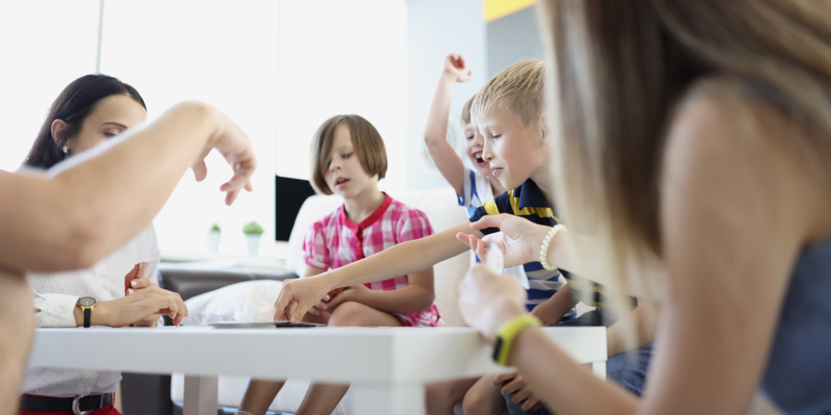Group of elementary school children engaged in a hands-on space-themed educational quiz, building excitement about space exploration through collaborative learning.